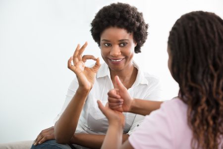 Adults using Sign Language