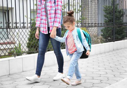 Parents walking kids to bathroom